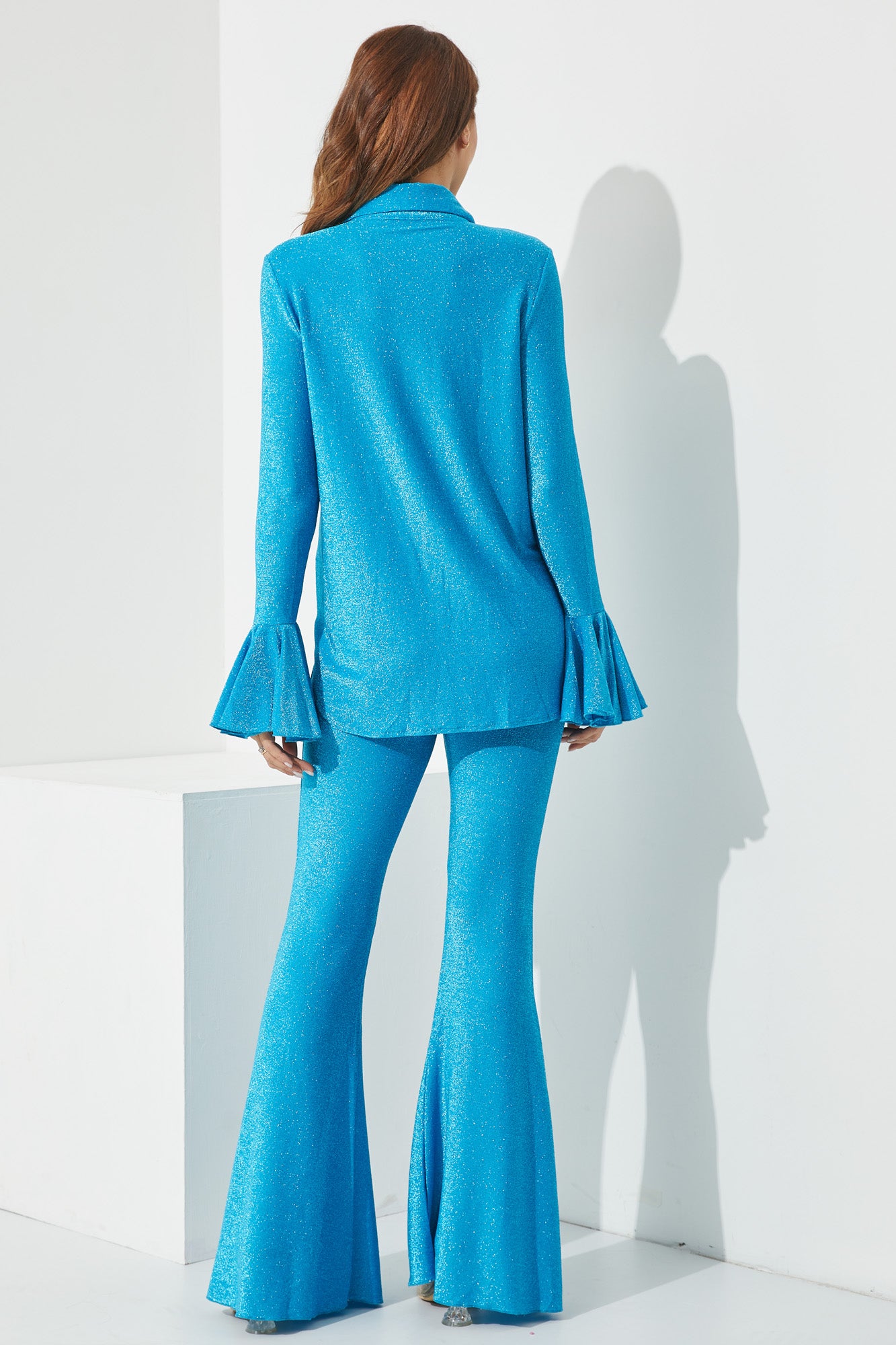 Knit Ruffle manga camisa y pantalones acampanados conjunto