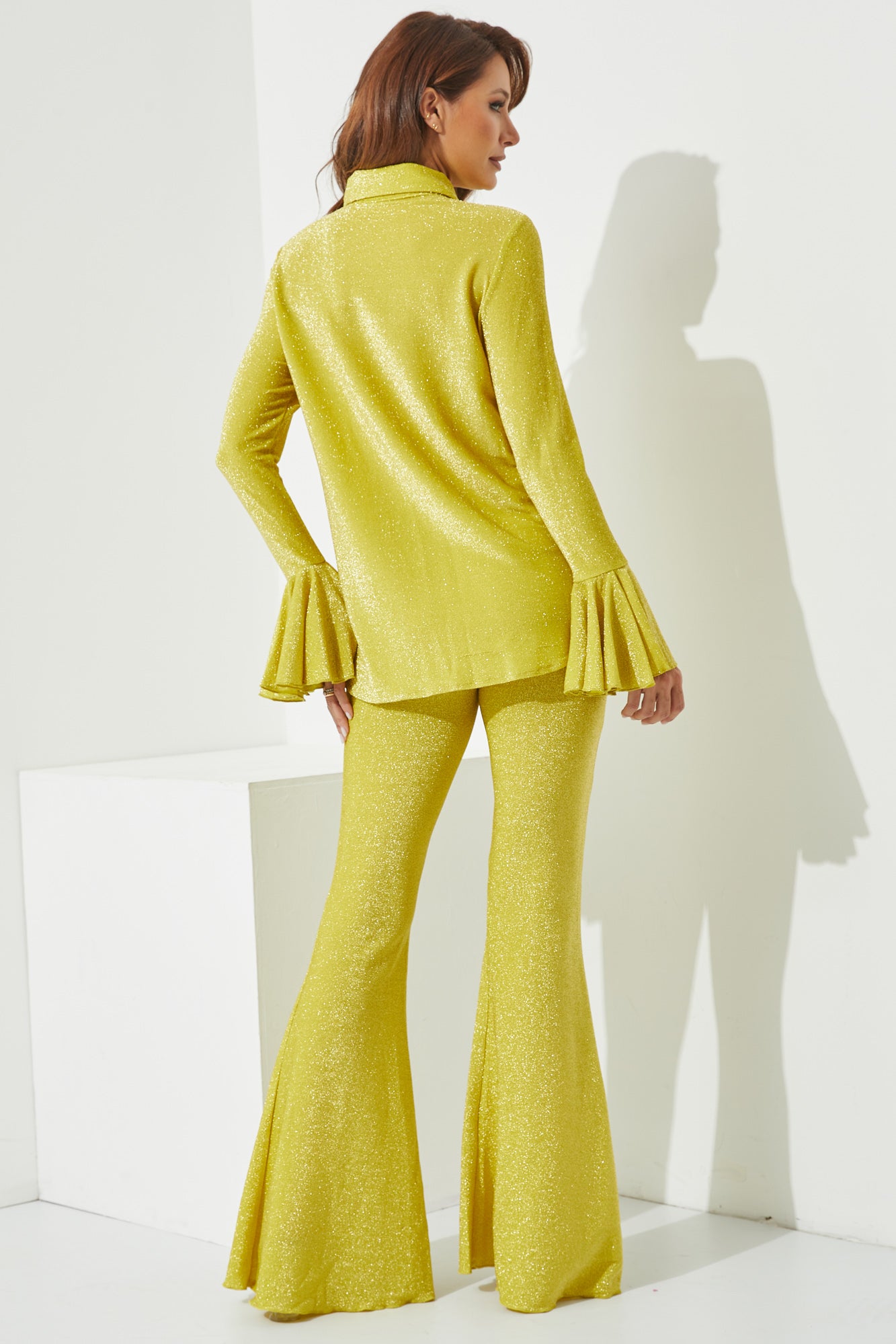 Knit Ruffle manga camisa y pantalones acampanados conjunto