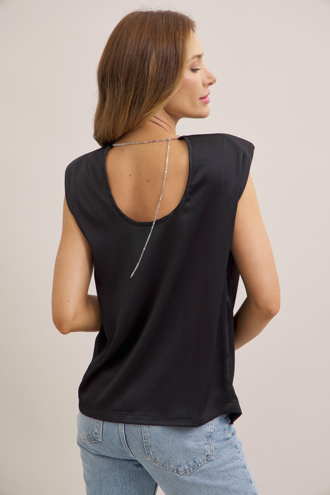 Chain-linked Sleeveless Top With Shoulder Pads