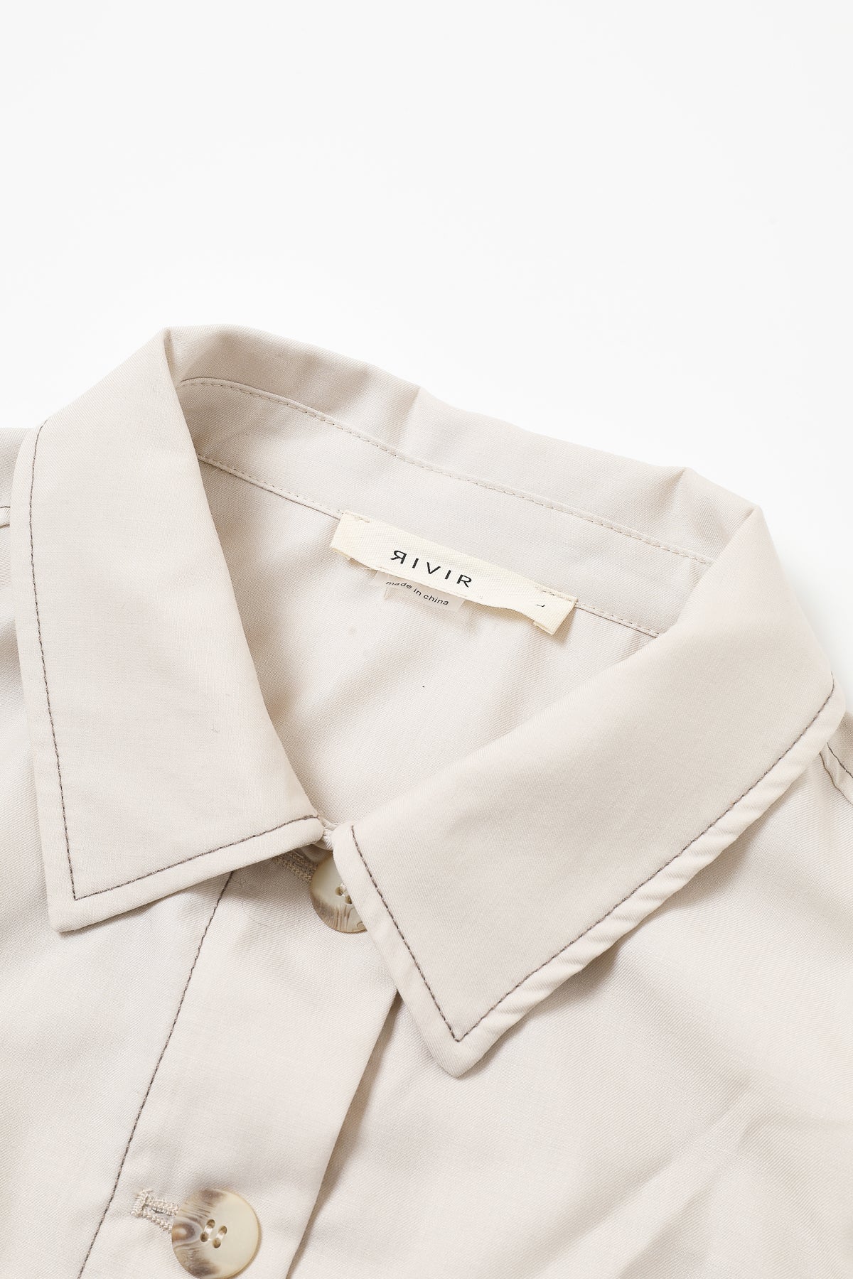 The Isometric Collared Woven Sleeveless Top Contrast Stitch