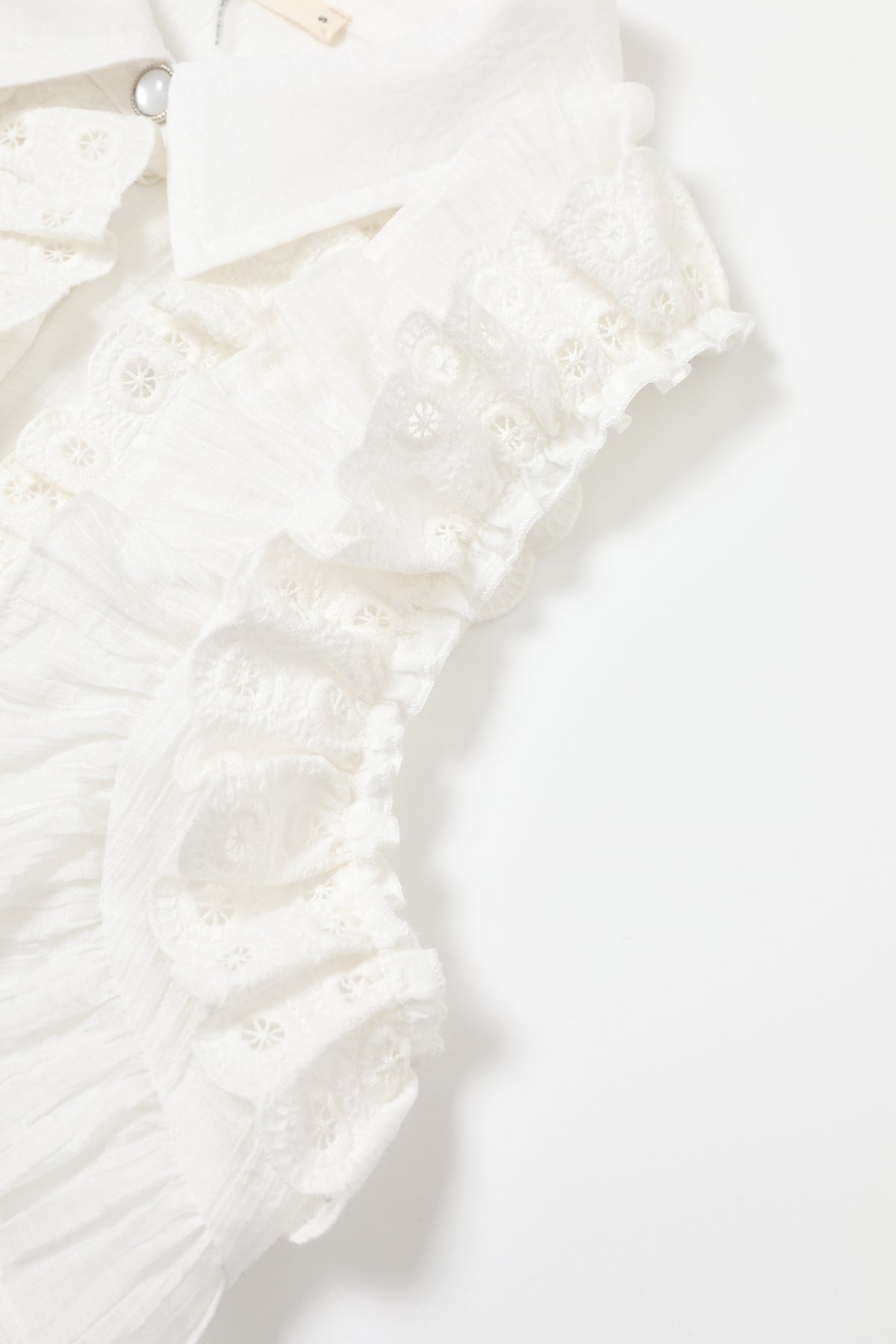 Chantilly Sleeveless Ruffle Blouse