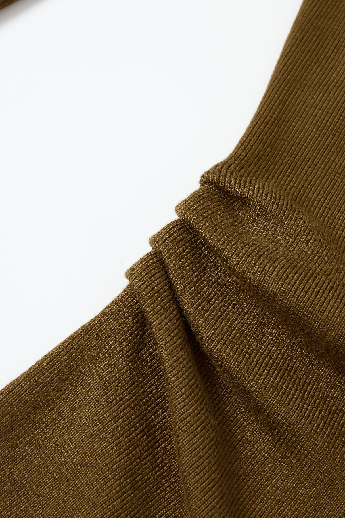 Knit Long Sleeve Top With Asymmetric Neck line And Gold Trim