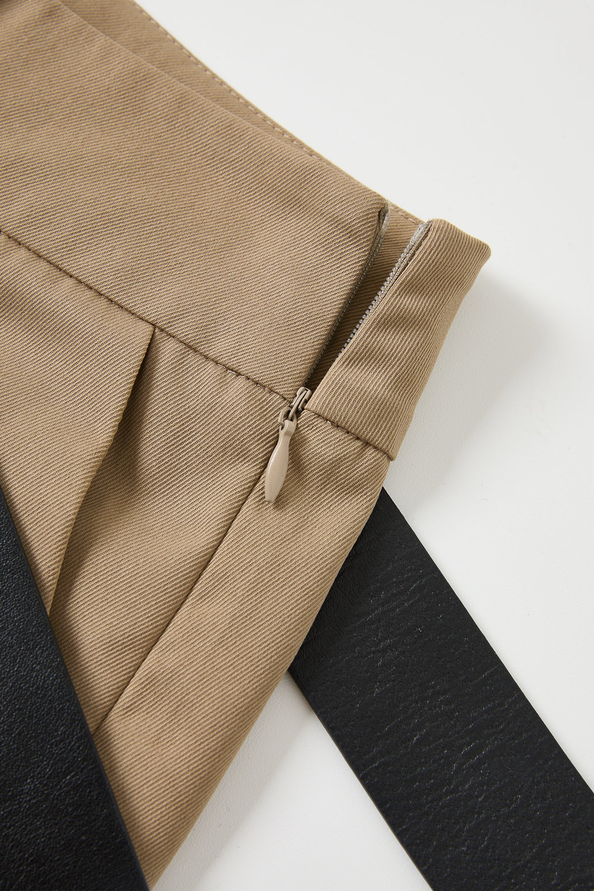 Axelle Woven Asymmetrical Pleated Pants with PU Belt