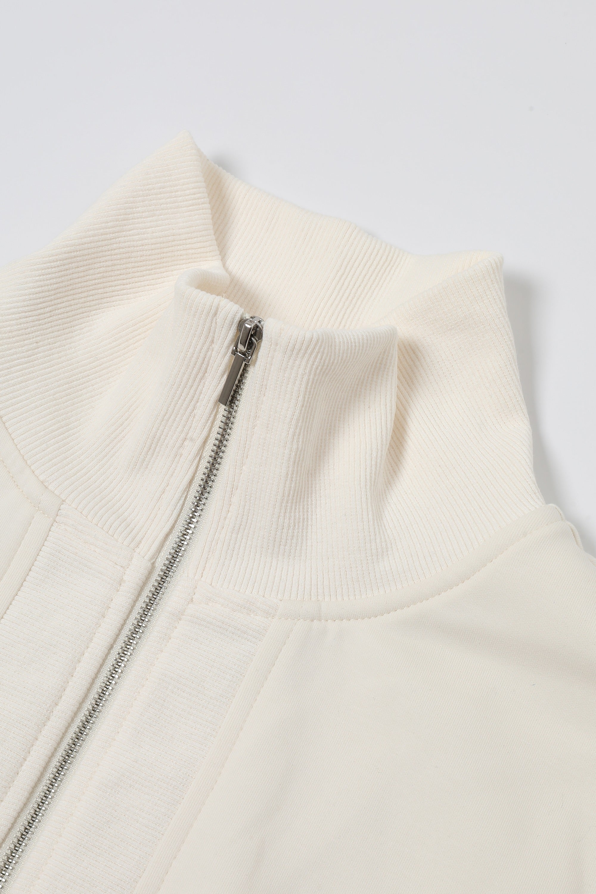 Apex Zip sleeveless Knit Top With Rib Detail